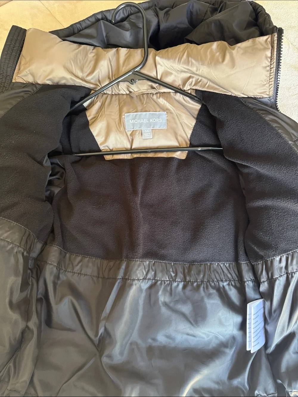 Michael Kors Kids Hooded Puffer Jacket in Black with Tan Lining. Size 5/6